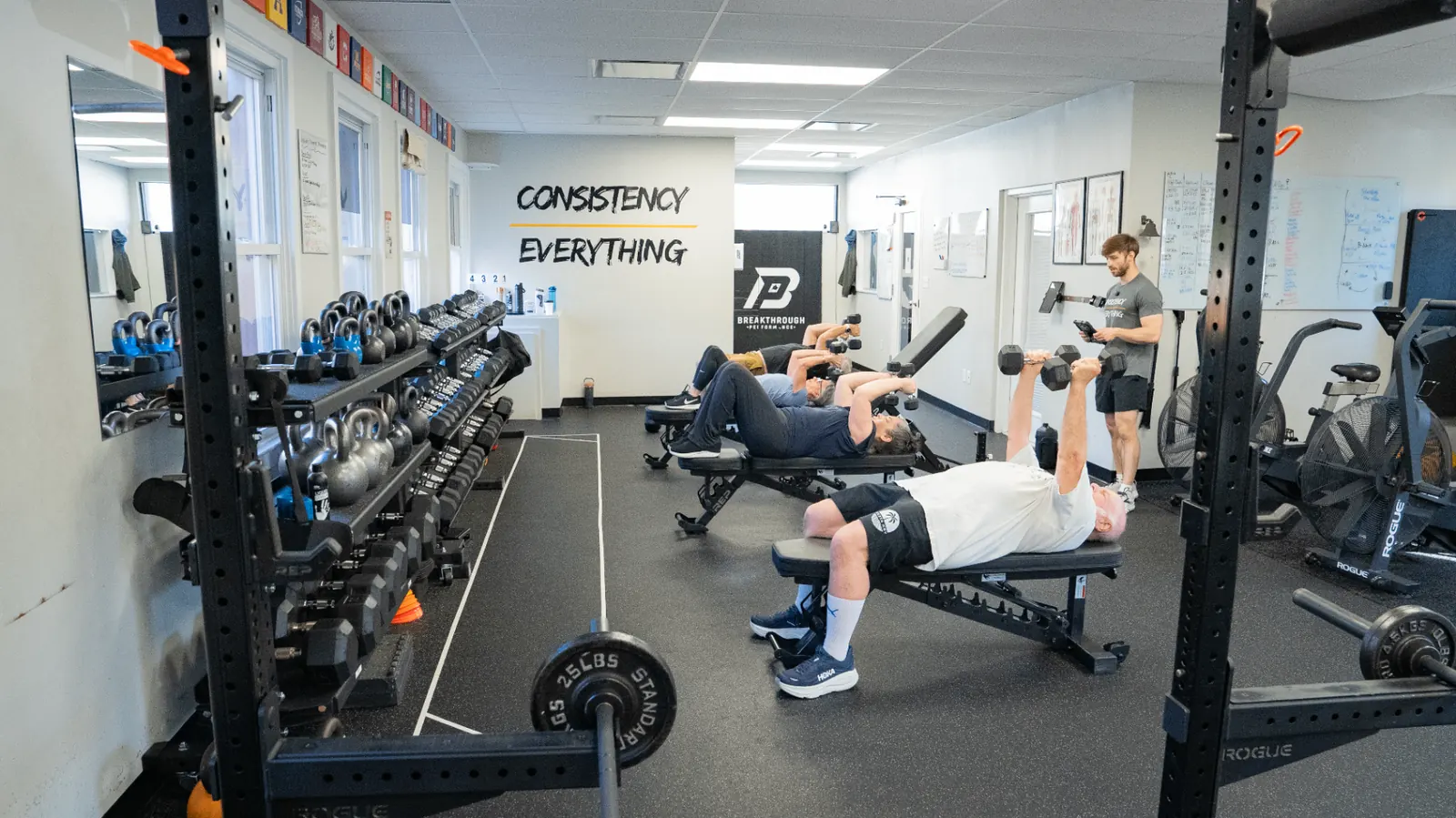 Adults and athletes training together at Breakthrough Performance gym in Huntington, NY